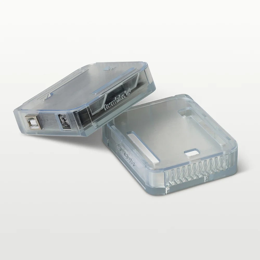 Clear 3D printed enclosure with Formlabs logo, printed on Form Studio 1